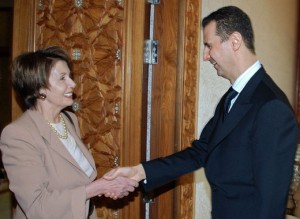 Syrian President Bashar al-Assad shakes hands with U.S. House Speaker Nancy Pelosi in Damascus