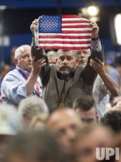 Rice rnc convention 2 holding flag