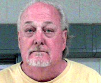 Douglas Snow Poses as Veteran