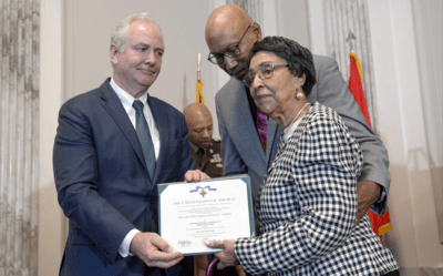 Woodson’s widow receives his posthumous DSC